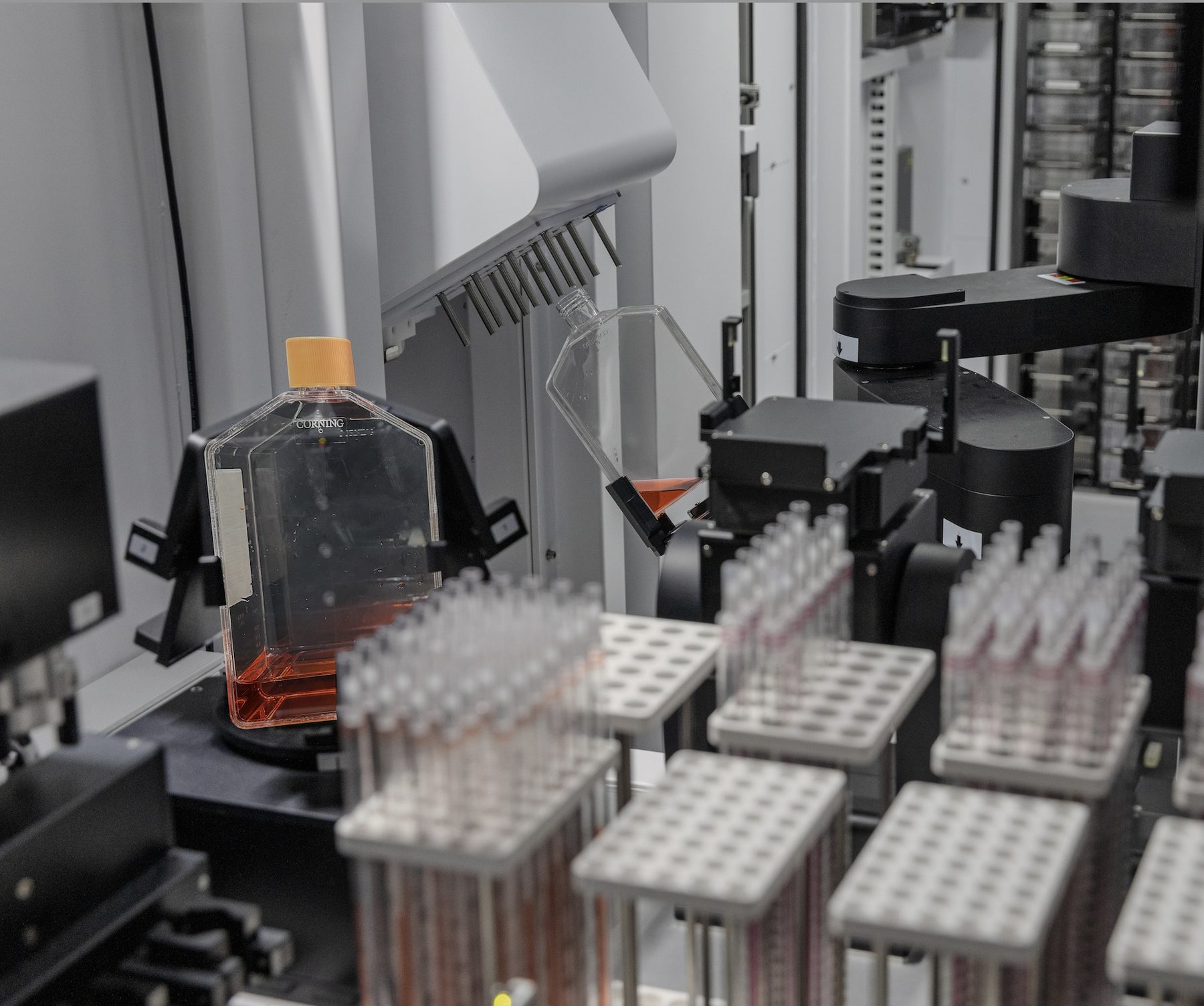 Celltrio Liquid Handler pipetting from a T-flask